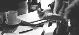 Women writing on a notepad